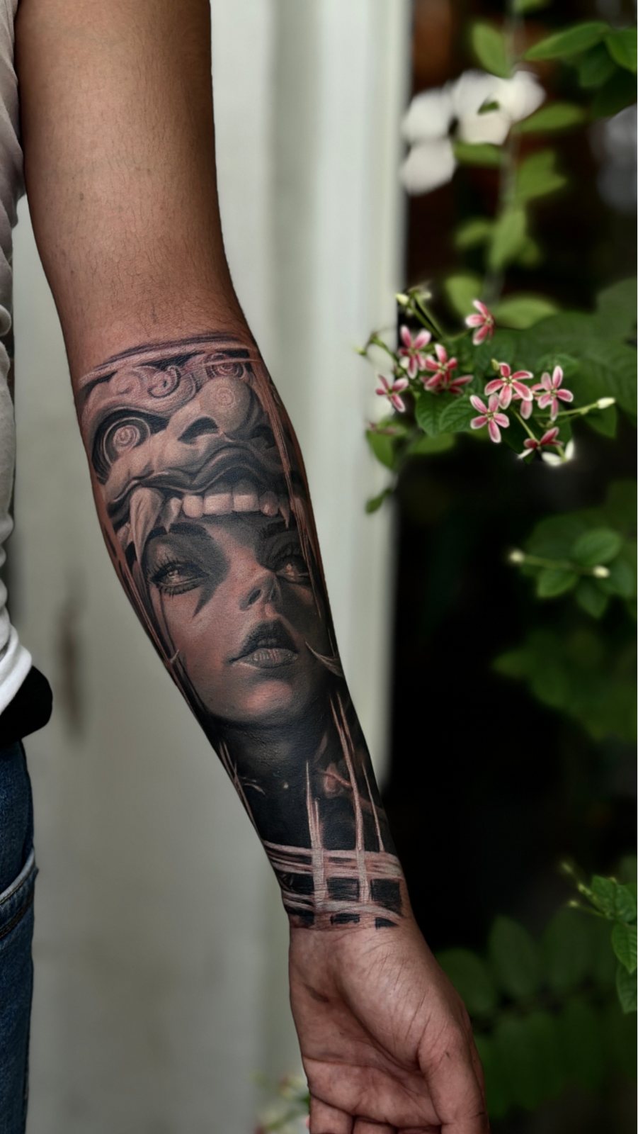 Realistic forearm sleeve tattoo
